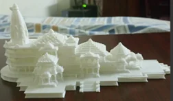 White architectural model parts with spires and roof details